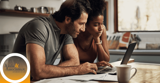 Couple looking at laptop