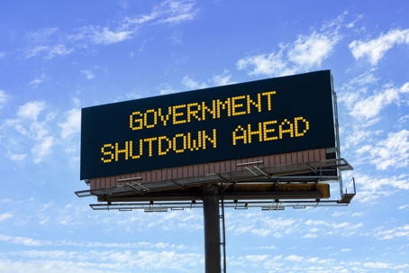 Electronic highway billboard with government shutdown ahead warning